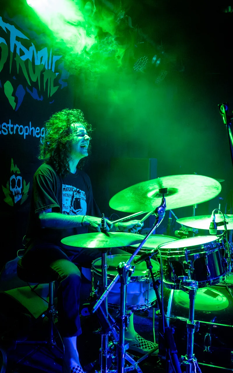 male drummer playing photograph
