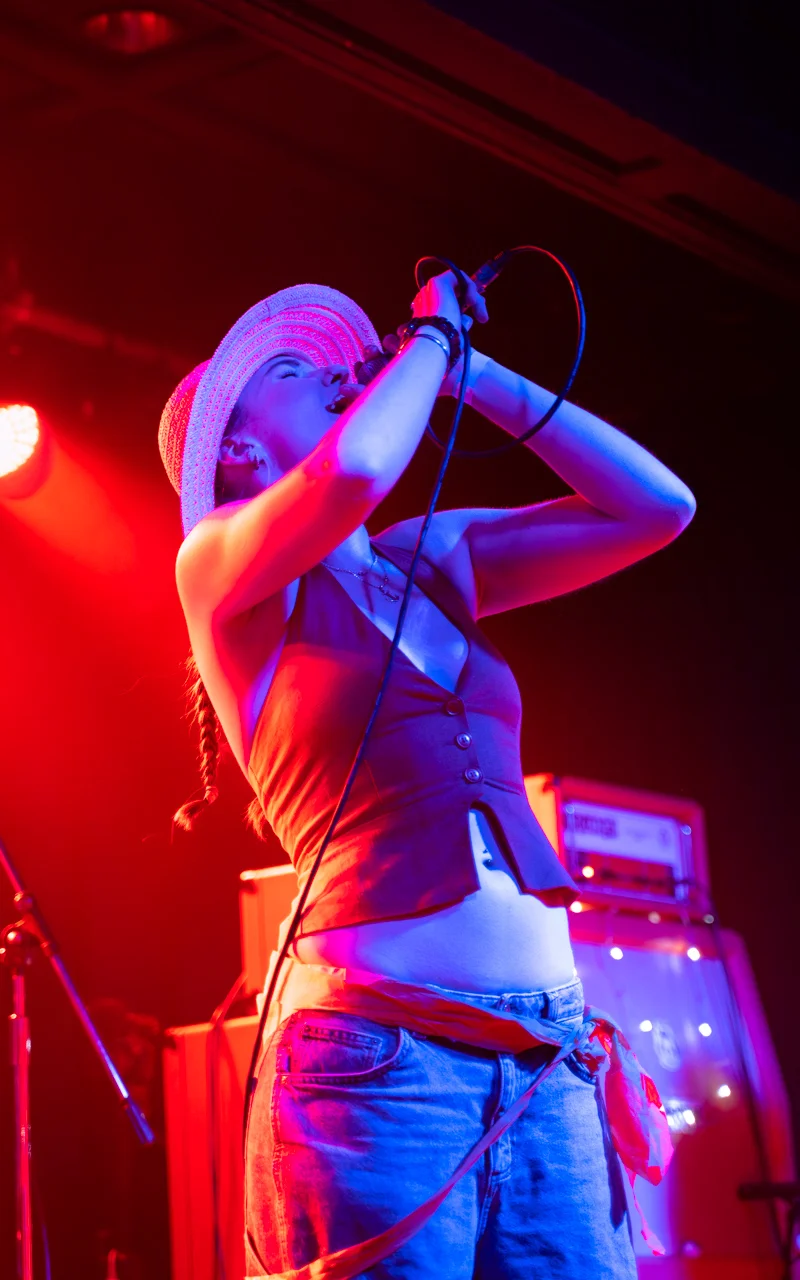 female singer on stage photograph