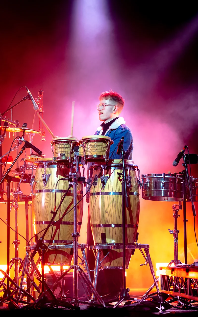 drummer under amazing stage lights photograph